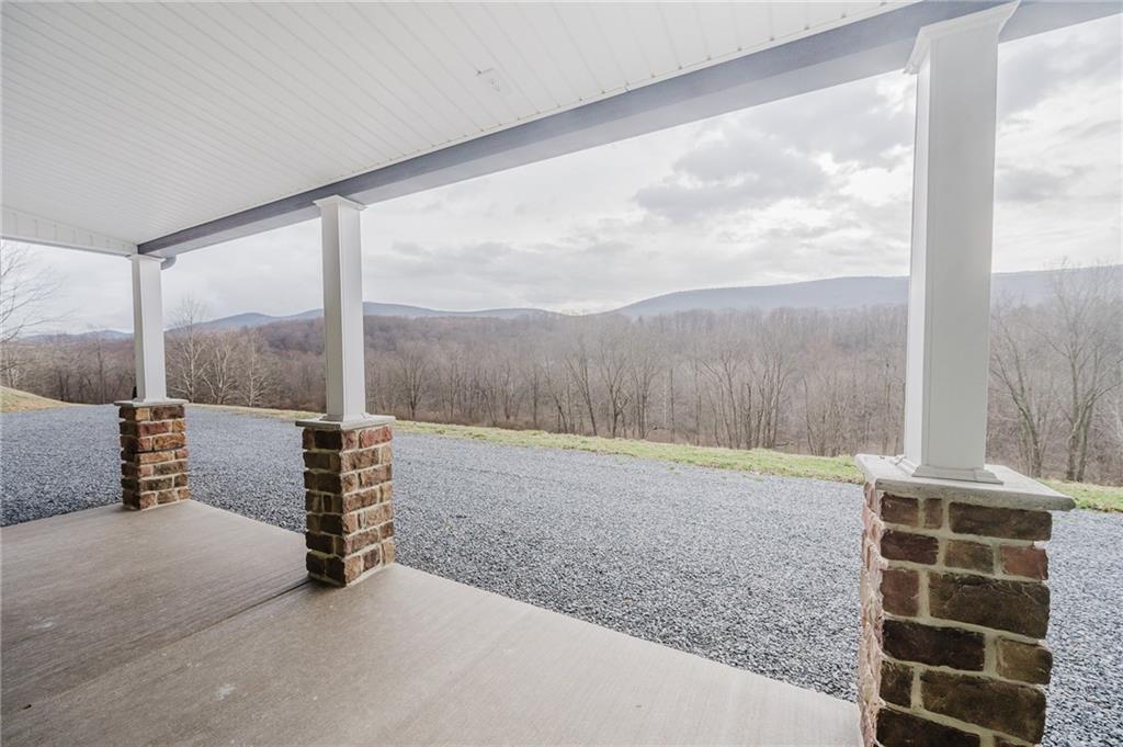 143 Chimney Ridge Road Bedford, PA 15522 - Photo 6 of 50 a view of an empty room with windows