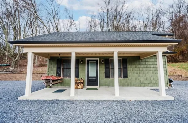 a view of a house with a porch