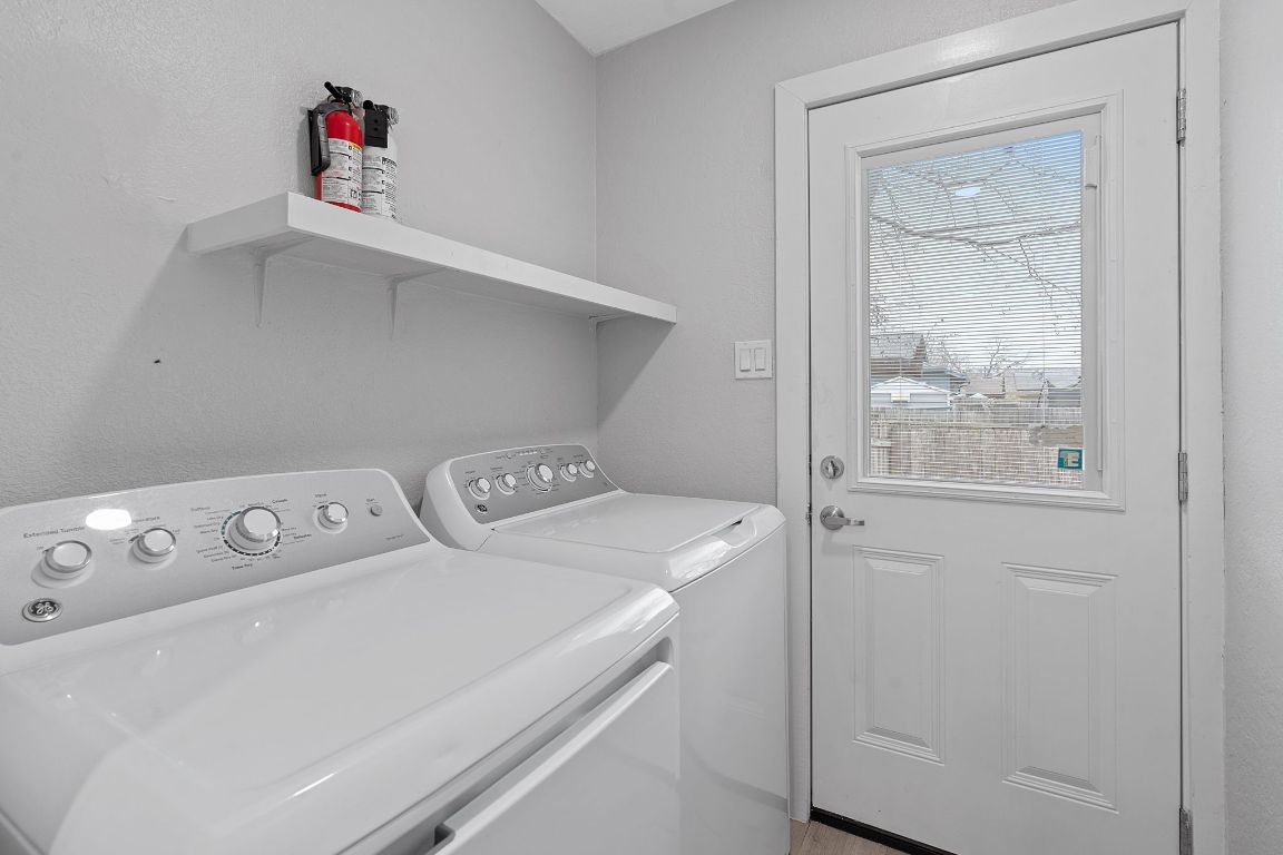 16131 Stoneham Circle Pflugerville, TX 78660 - Photo 11 of 19 a utility room with dryer and washer