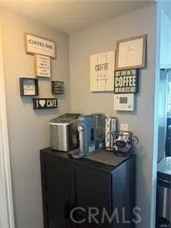 a kitchen with a stove and a refrigerator