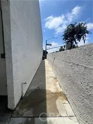 a view of a pathway with a yard