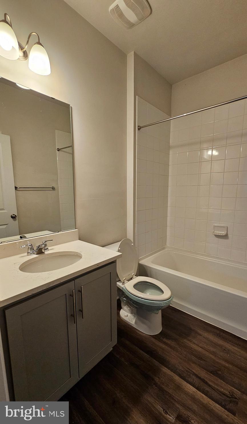 5147 Constitution Street Frederick, MD 21703 - Photo 14 of 23 a bathroom with a double vanity sink toilet and shower