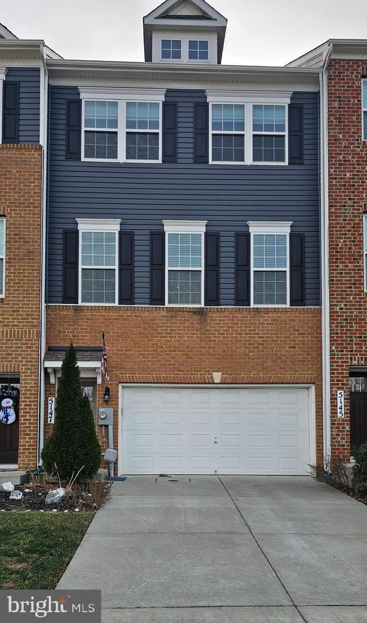 5147 Constitution Street Frederick, MD 21703 - Photo 2 of 23 a front view of a building with yard
