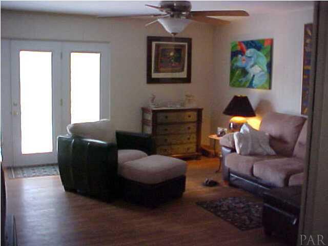 3630 Bonner Road Pensacola, FL 32503 - Photo 4 of 8 Family area with glass doors leading to private backyard.