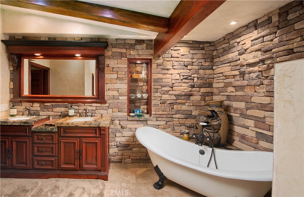 30602 Hasley Canyon Road Castaic, CA 91384 - Photo 19 of 72 a bathroom with a sink and a mirror