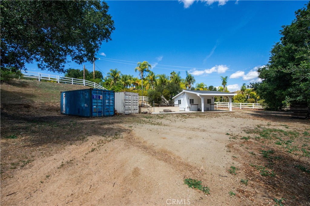 30602 Hasley Canyon Road Castaic, CA 91384 - Photo 54 of 72 a house view with a garden space
