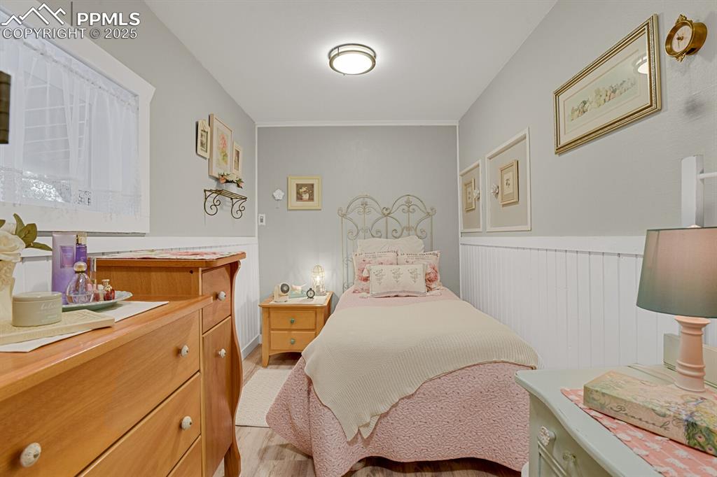 4540 Fountain Avenue Cascade, CO 80809 - Photo 24 of 50 a bedroom with a bed and furniture