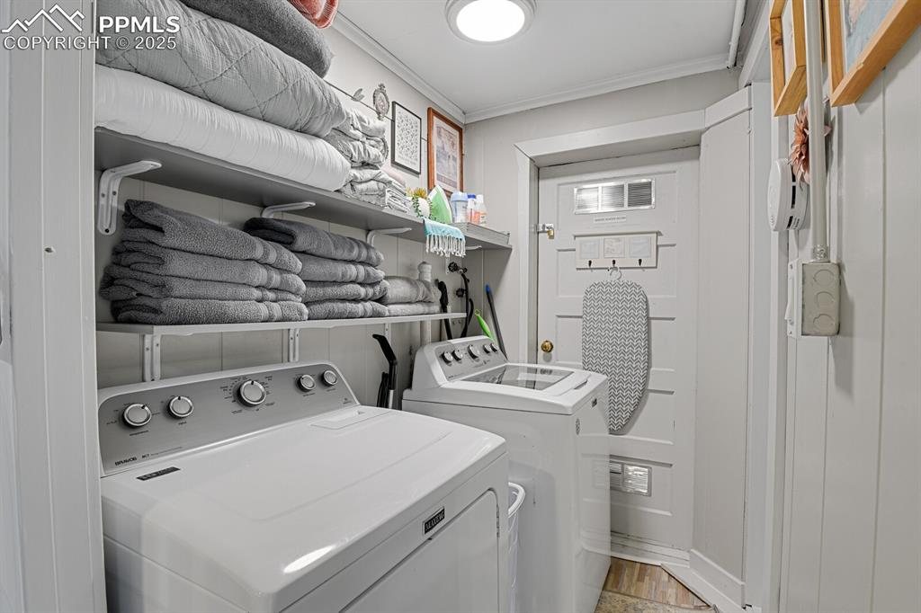 4540 Fountain Avenue Cascade, CO 80809 - Photo 40 of 50 a utility room with dryer and washer