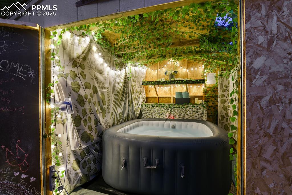 4540 Fountain Avenue Cascade, CO 80809 - Photo 44 of 50 a bathroom with a sink and a mirror