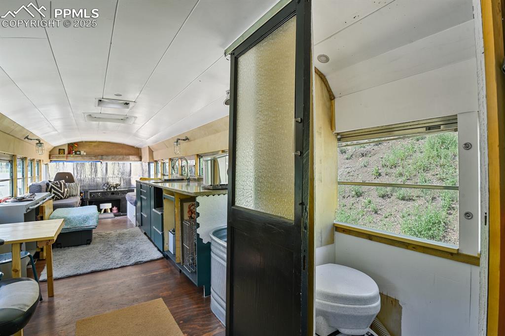 4540 Fountain Avenue Cascade, CO 80809 - Photo 48 of 50 a living room with lots of furniture and a large window