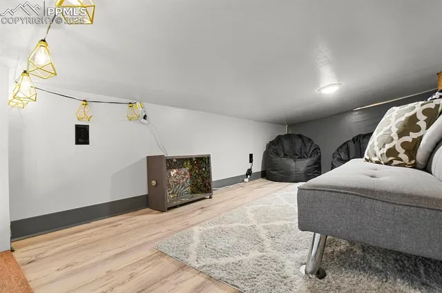 a bedroom with bed and window