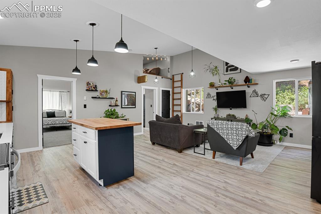 4540 Fountain Avenue Cascade, CO 80809 - Photo 7 of 50 a living room with furniture and a wooden floor