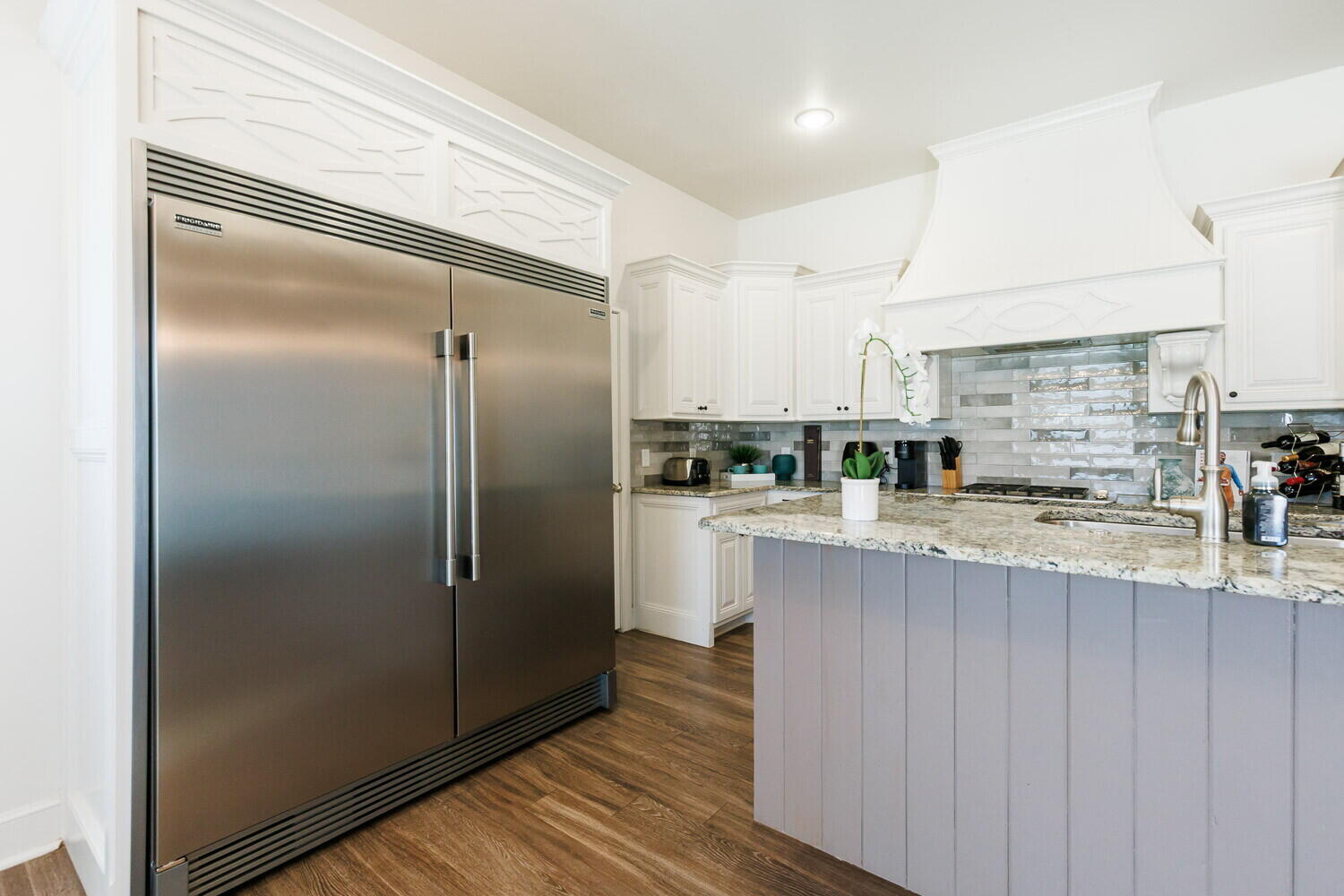 3812 135th Street Lubbock, TX 79423 - Photo 11 of 41 a kitchen with stainless steel appliances granite countertop a refrigerator and a stove