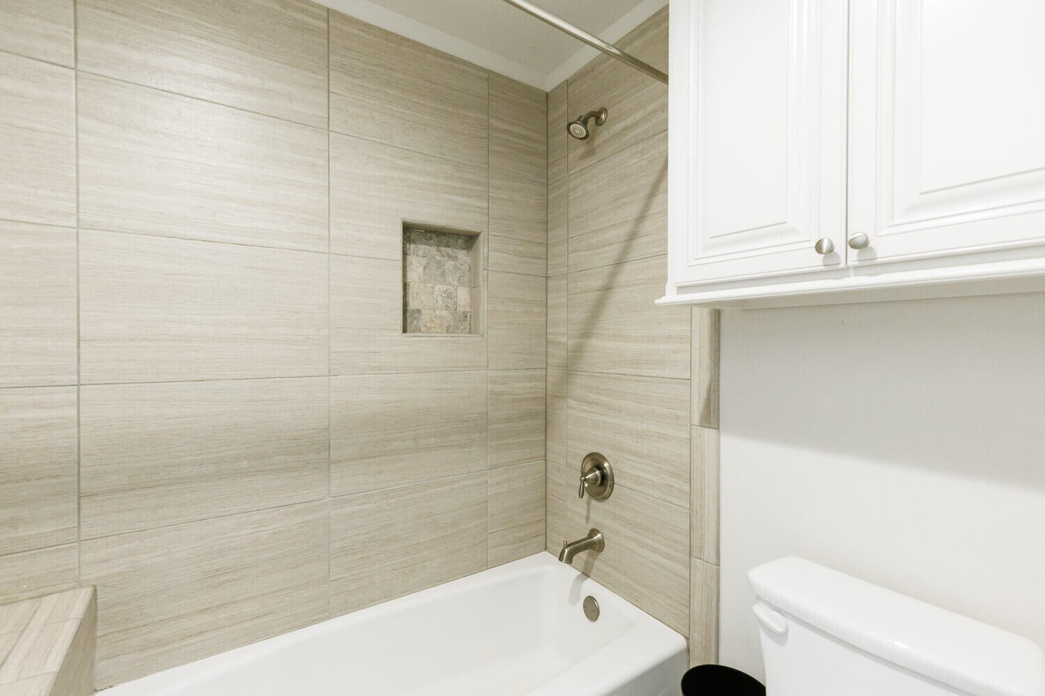 3812 135th Street Lubbock, TX 79423 - Photo 20 of 41 a bathroom with a bathtub and a shower