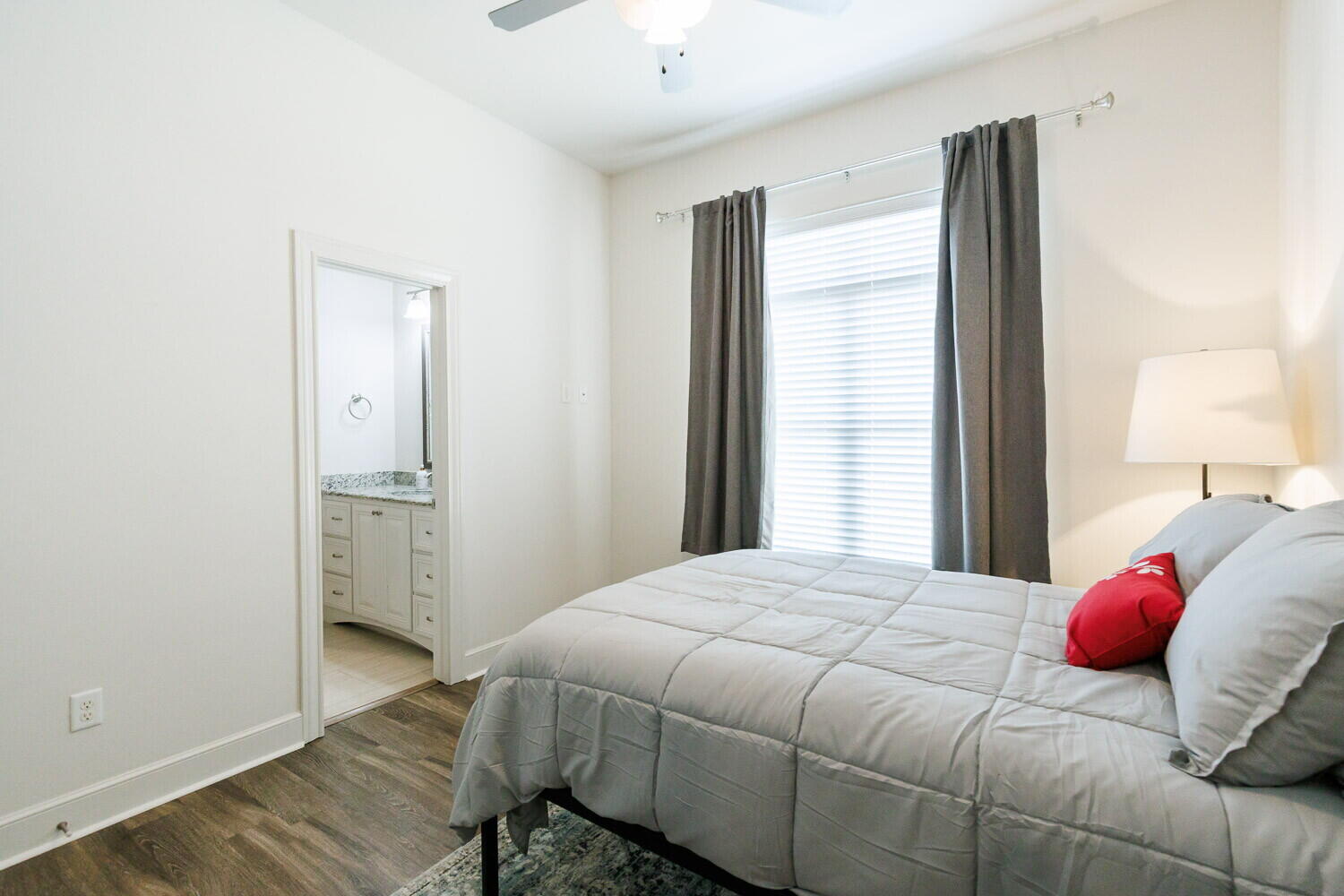 3812 135th Street Lubbock, TX 79423 - Photo 22 of 41 a bedroom with a bed and a window