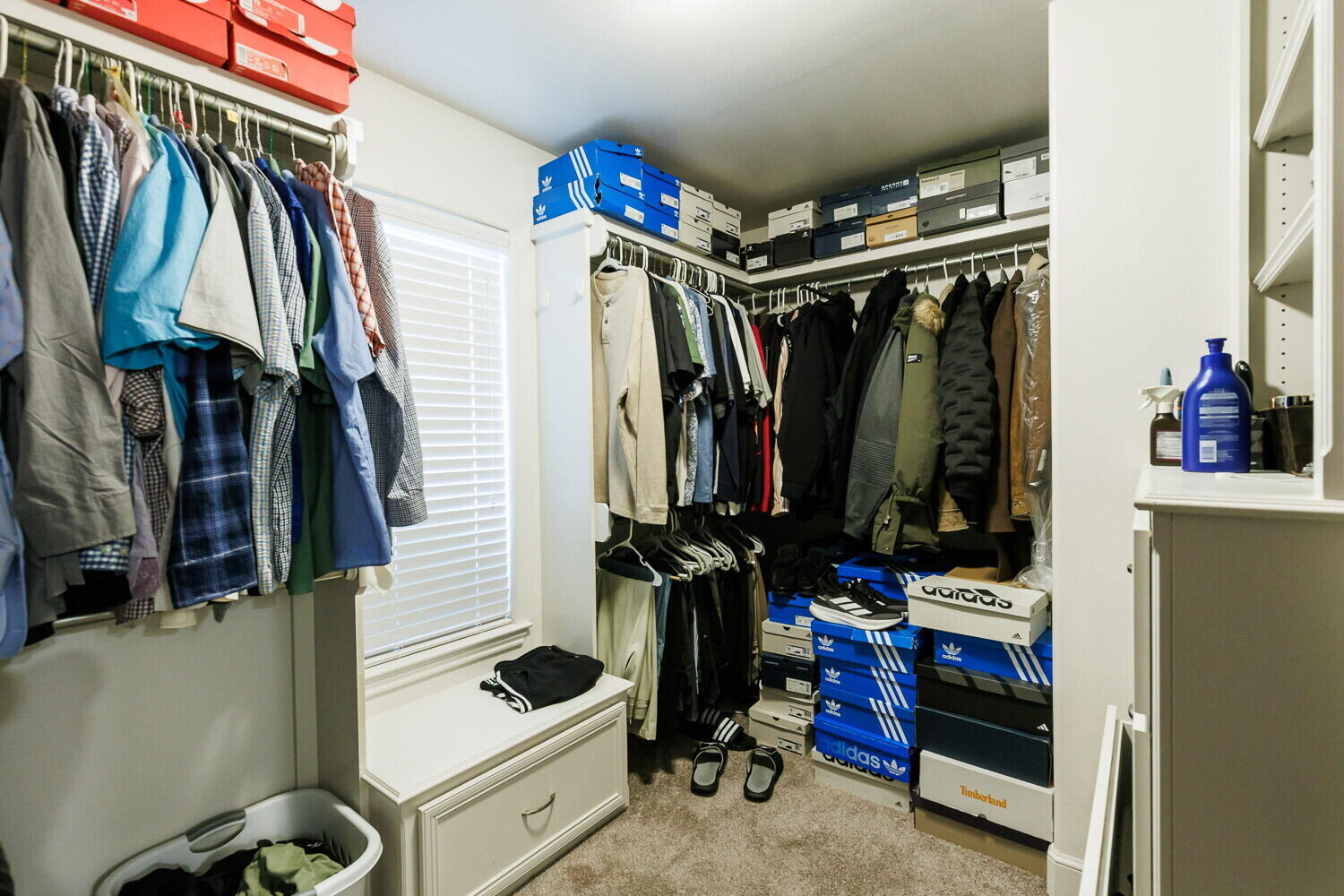 3812 135th Street Lubbock, TX 79423 - Photo 35 of 41 a view of walk in closet with clothes and shoes
