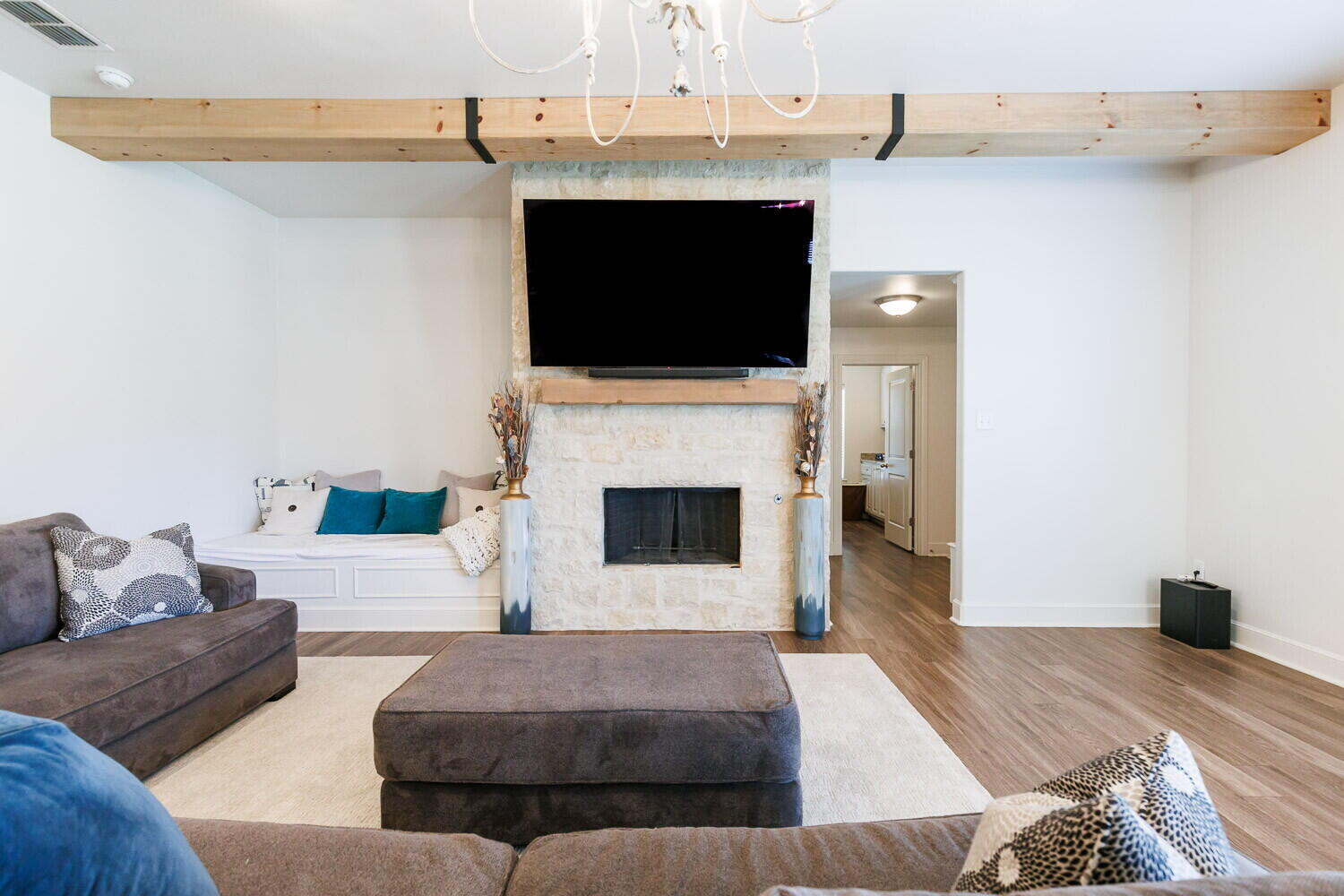 3812 135th Street Lubbock, TX 79423 - Photo 4 of 41 a living room with furniture a flat screen tv and a fireplace