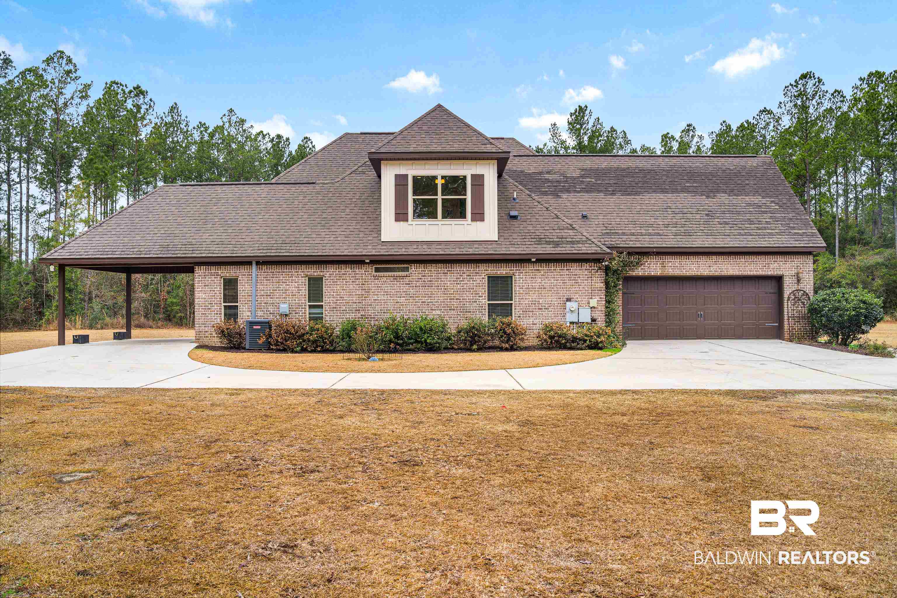 36784 Legacy Way Bay Minette, AL 36507 - Photo 48 of 57 View of side of home featuring a carport and double garage.