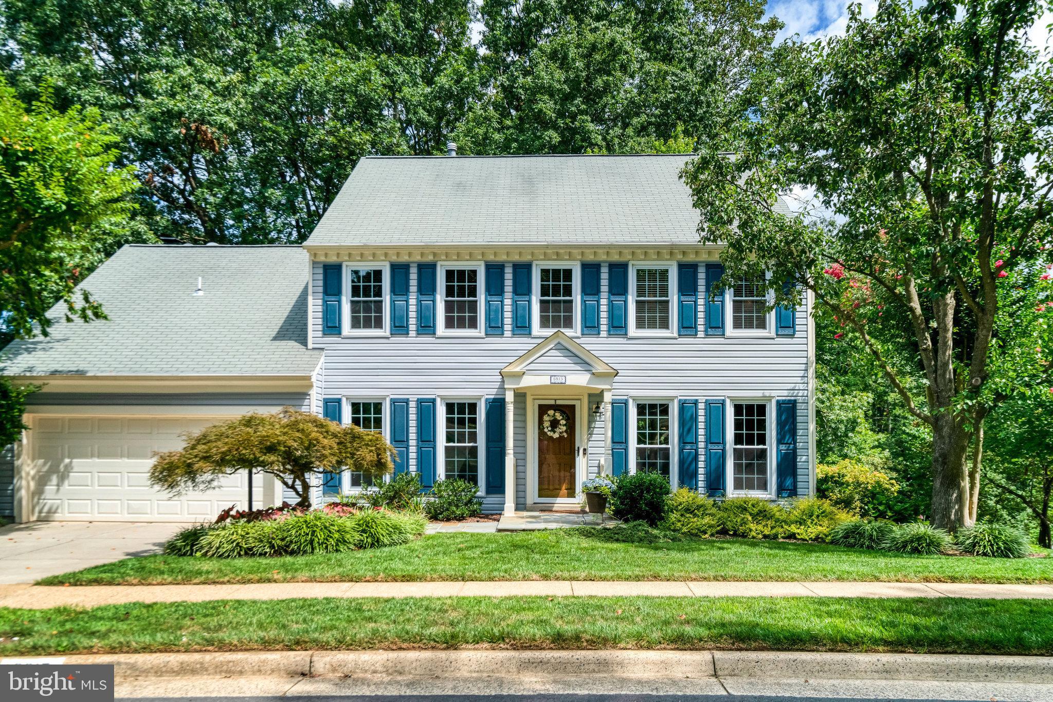 6815 Bluecurl Circle Springfield, VA 22152 - Photo 1 of 49 a front view of a house with a yard