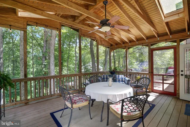 a view of a outdoor space with table and chairs