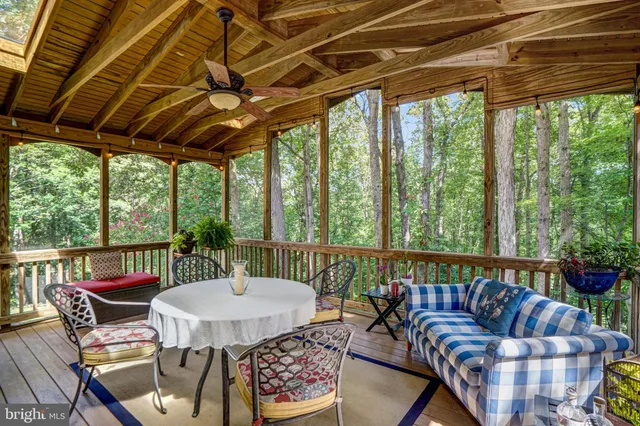 a outdoor living space with furniture and outdoor view