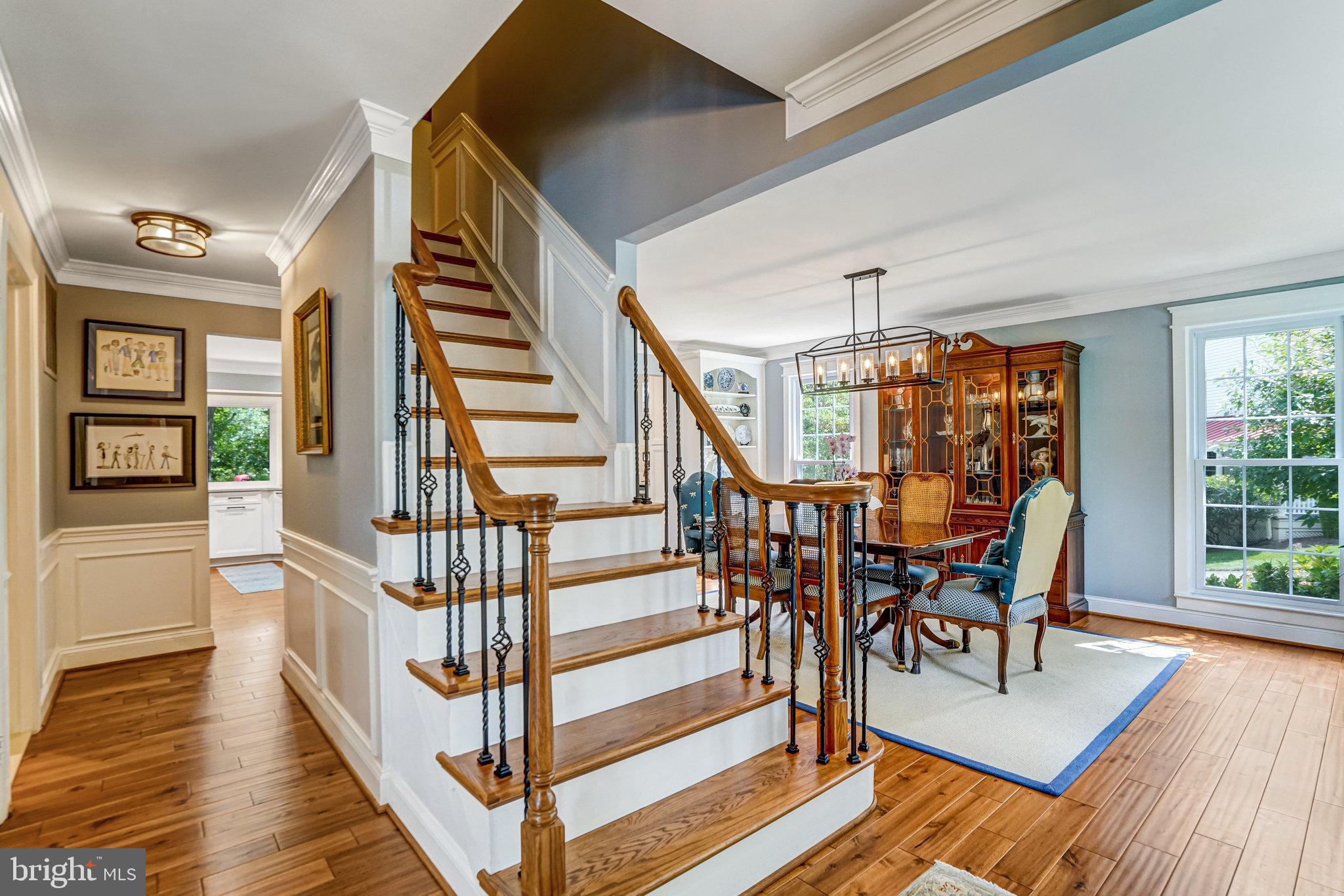 6815 Bluecurl Circle Springfield, VA 22152 - Photo 2 of 49 a view of entryway dining room and hall with wooden floor