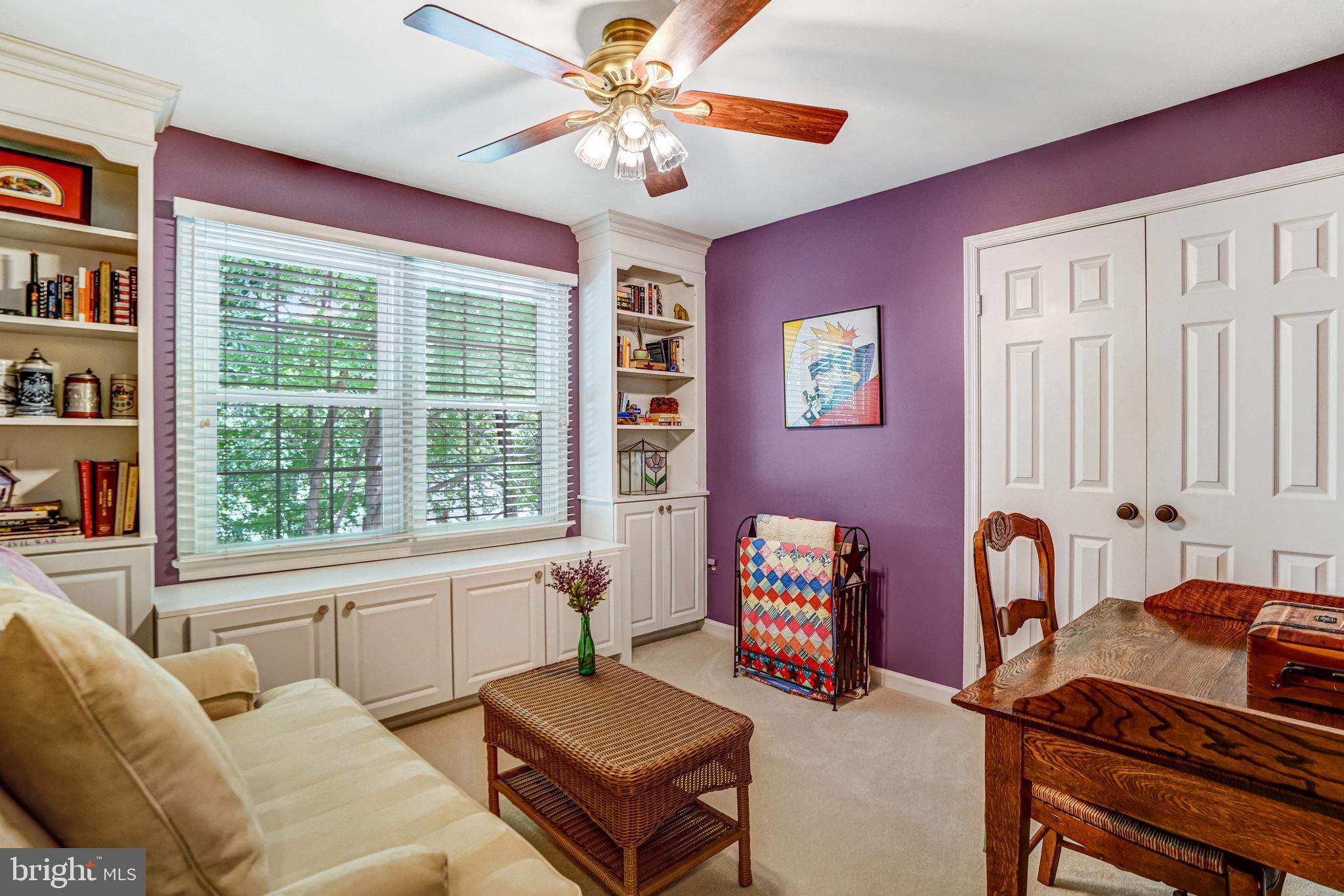 6815 Bluecurl Circle Springfield, VA 22152 - Photo 29 of 49 a living room with furniture and windows