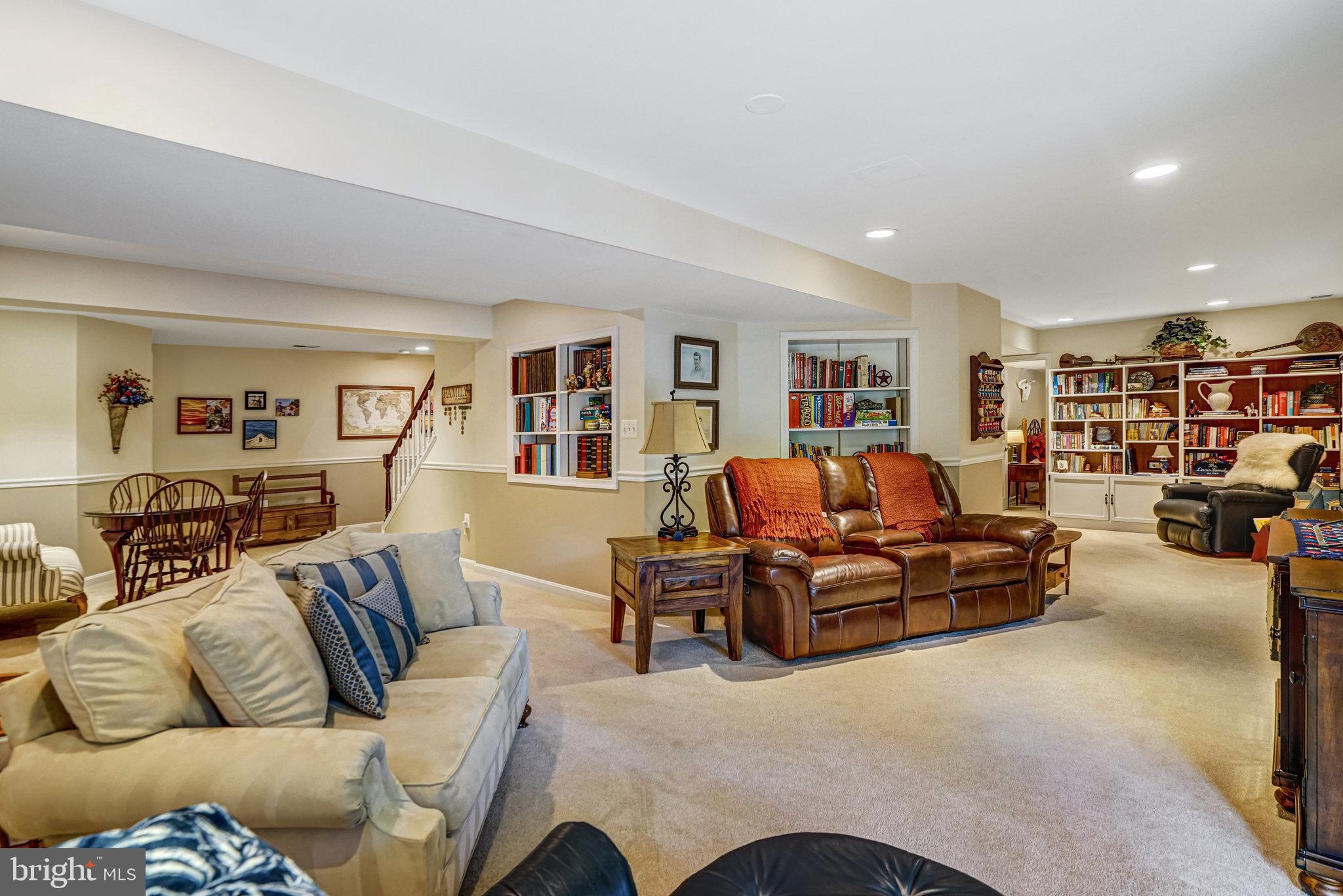6815 Bluecurl Circle Springfield, VA 22152 - Photo 33 of 49 a living room with furniture and a couch