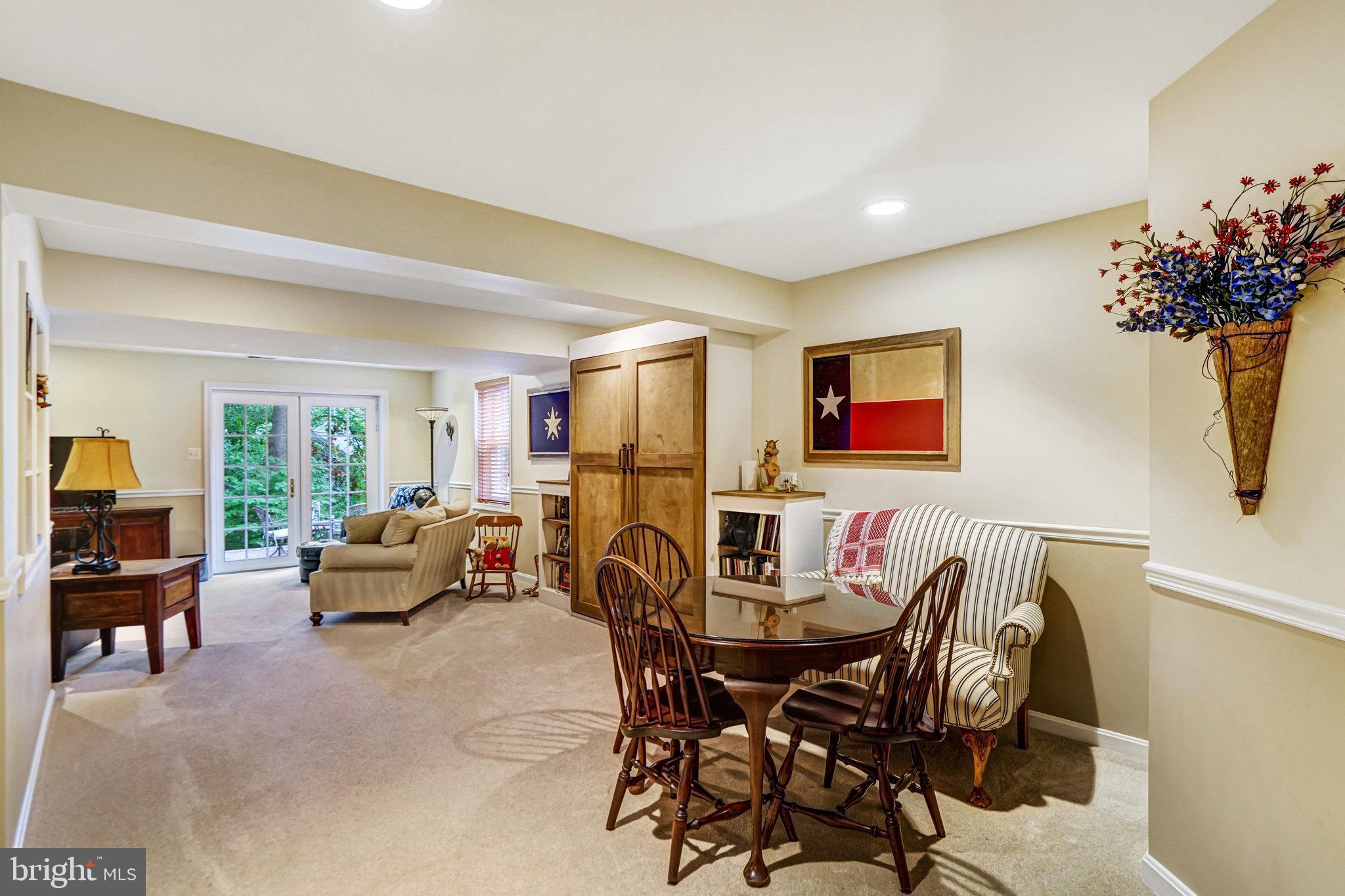 6815 Bluecurl Circle Springfield, VA 22152 - Photo 35 of 49 a living room with furniture and a large window