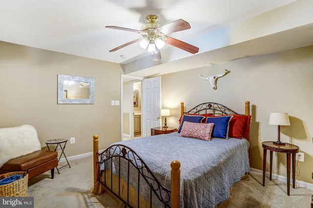 a bedroom with a bed and closet