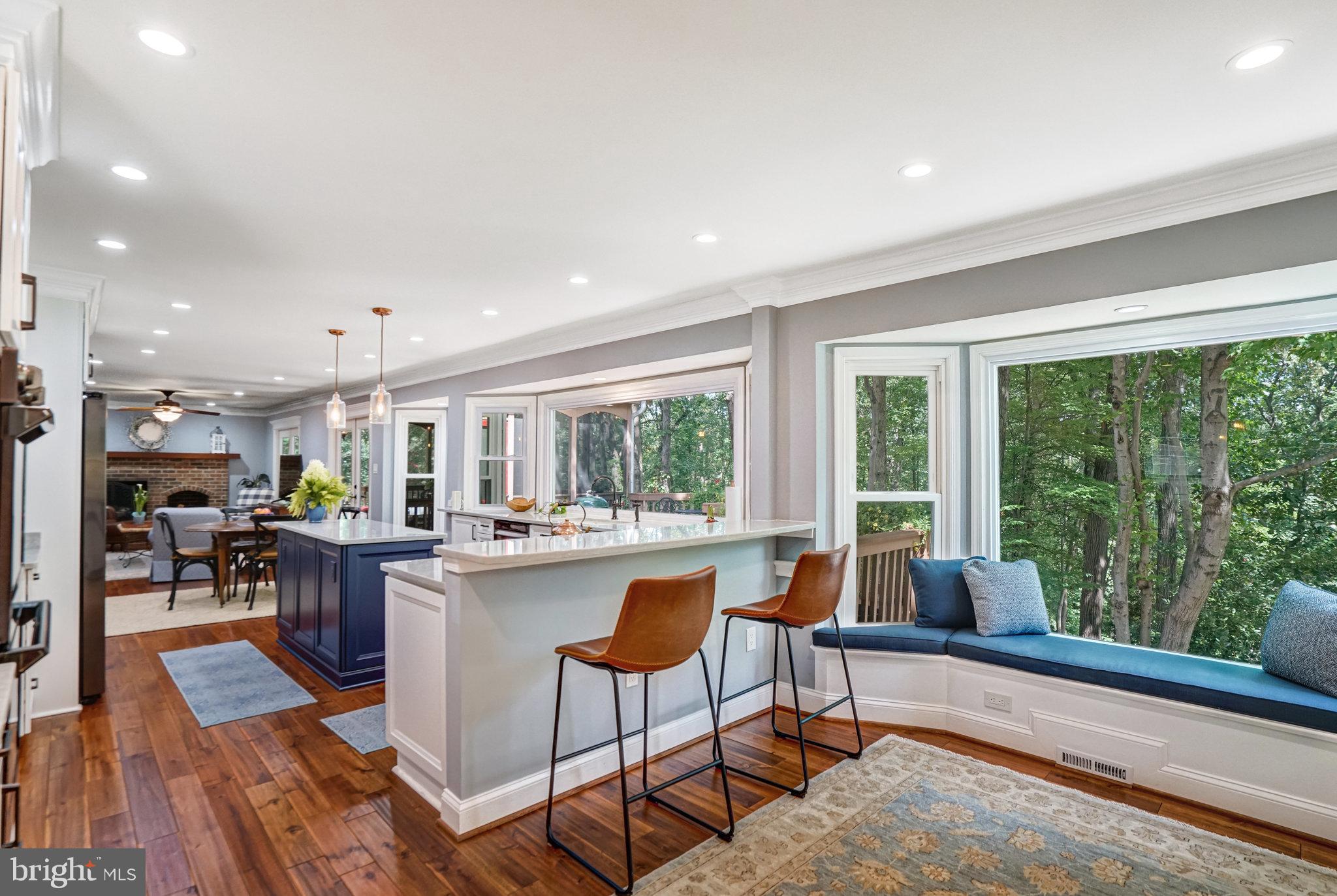 6815 Bluecurl Circle Springfield, VA 22152 - Photo 7 of 49 a living room with furniture and a large window