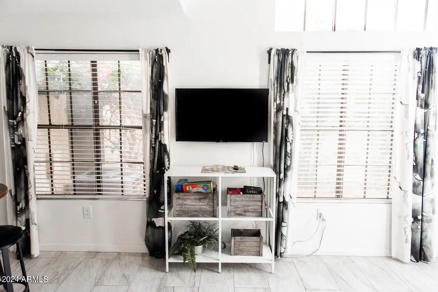 602 North May, Unit 7 Mesa, AZ 85201 - Photo 3 of 18 a living room with furniture and a flat screen tv