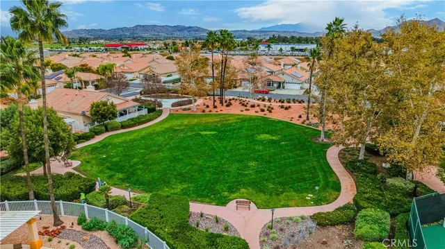 an aerial view of a house with a garden