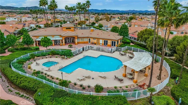 a view of a park with large trees