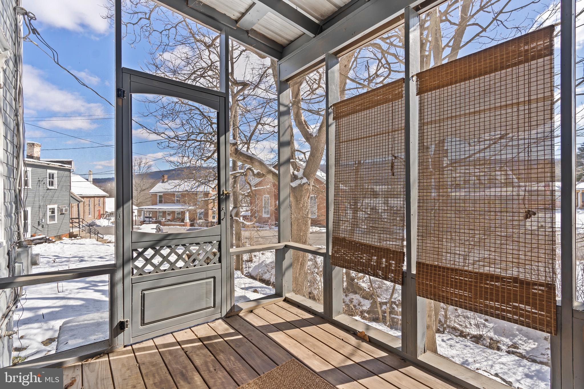 4312 Main Street Rohrersville, MD 21779 - Photo 17 of 58 a view of a balcony with wooden floor