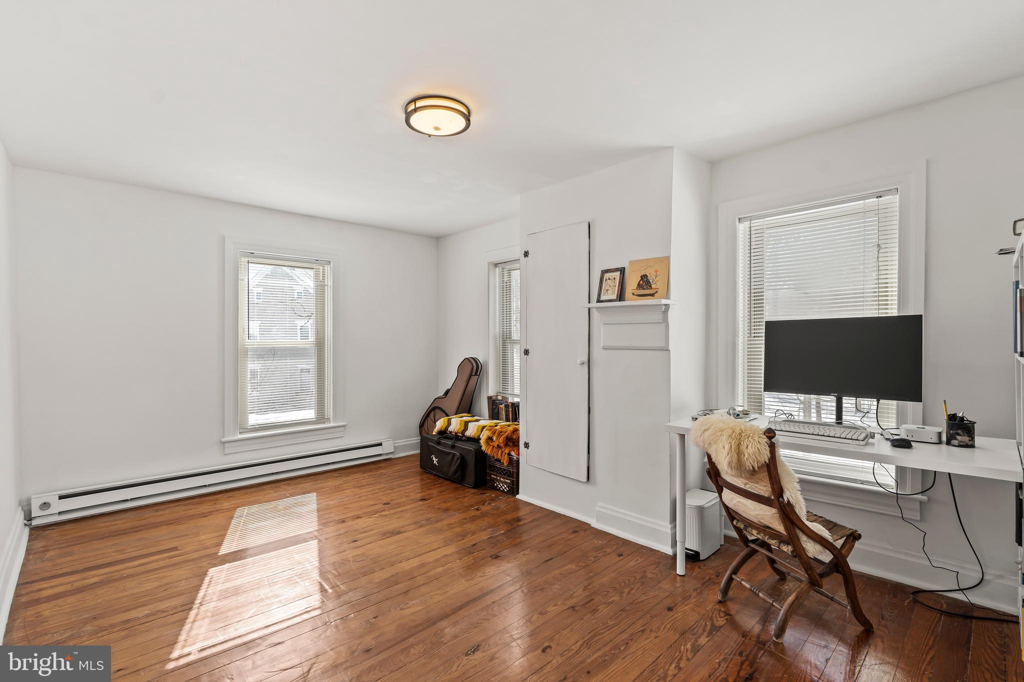 4312 Main Street Rohrersville, MD 21779 - Photo 18 of 58 a view of a workspace with wooden floor and a window