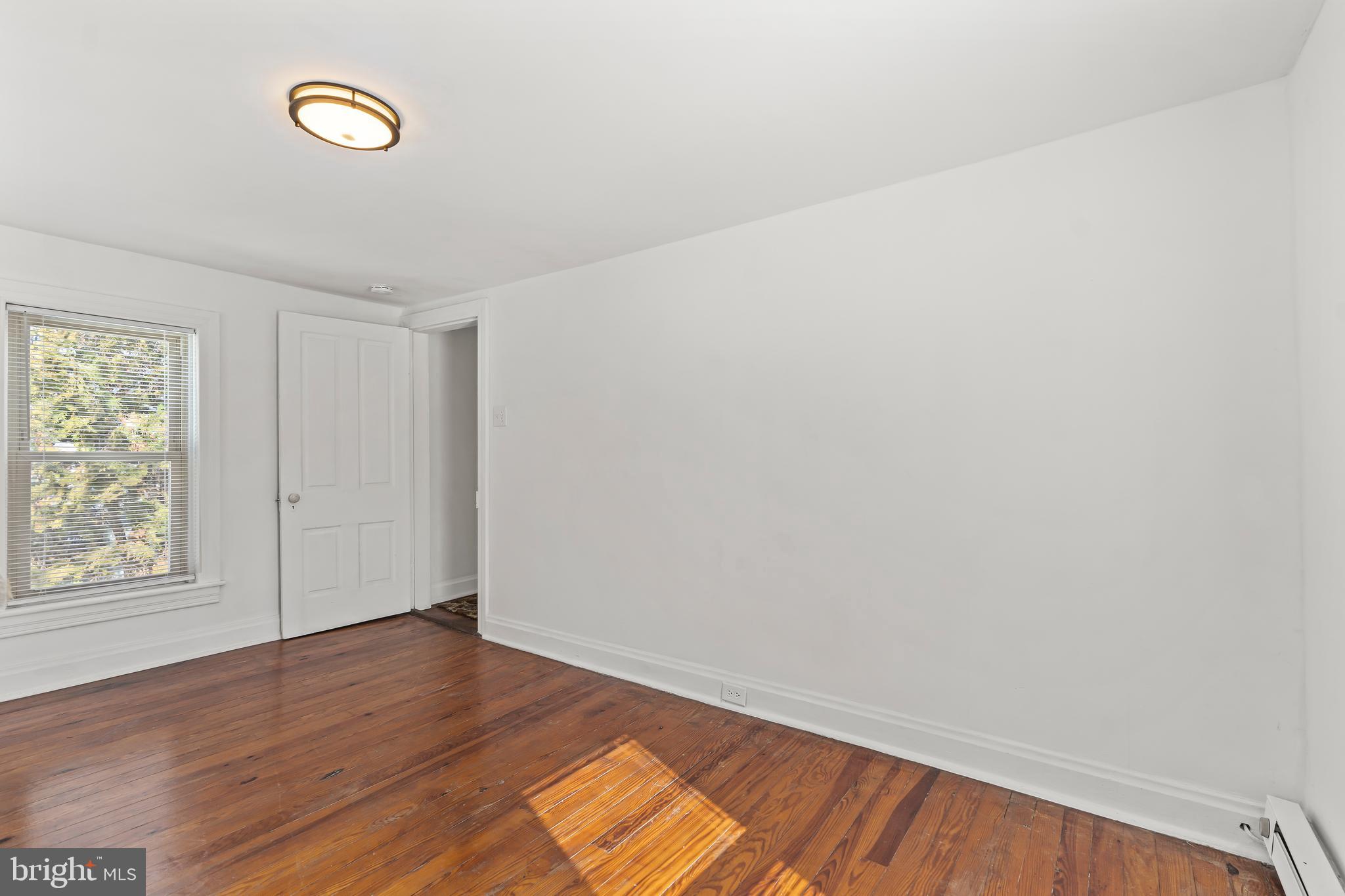 4312 Main Street Rohrersville, MD 21779 - Photo 20 of 58 a view of a room with wooden floor and window
