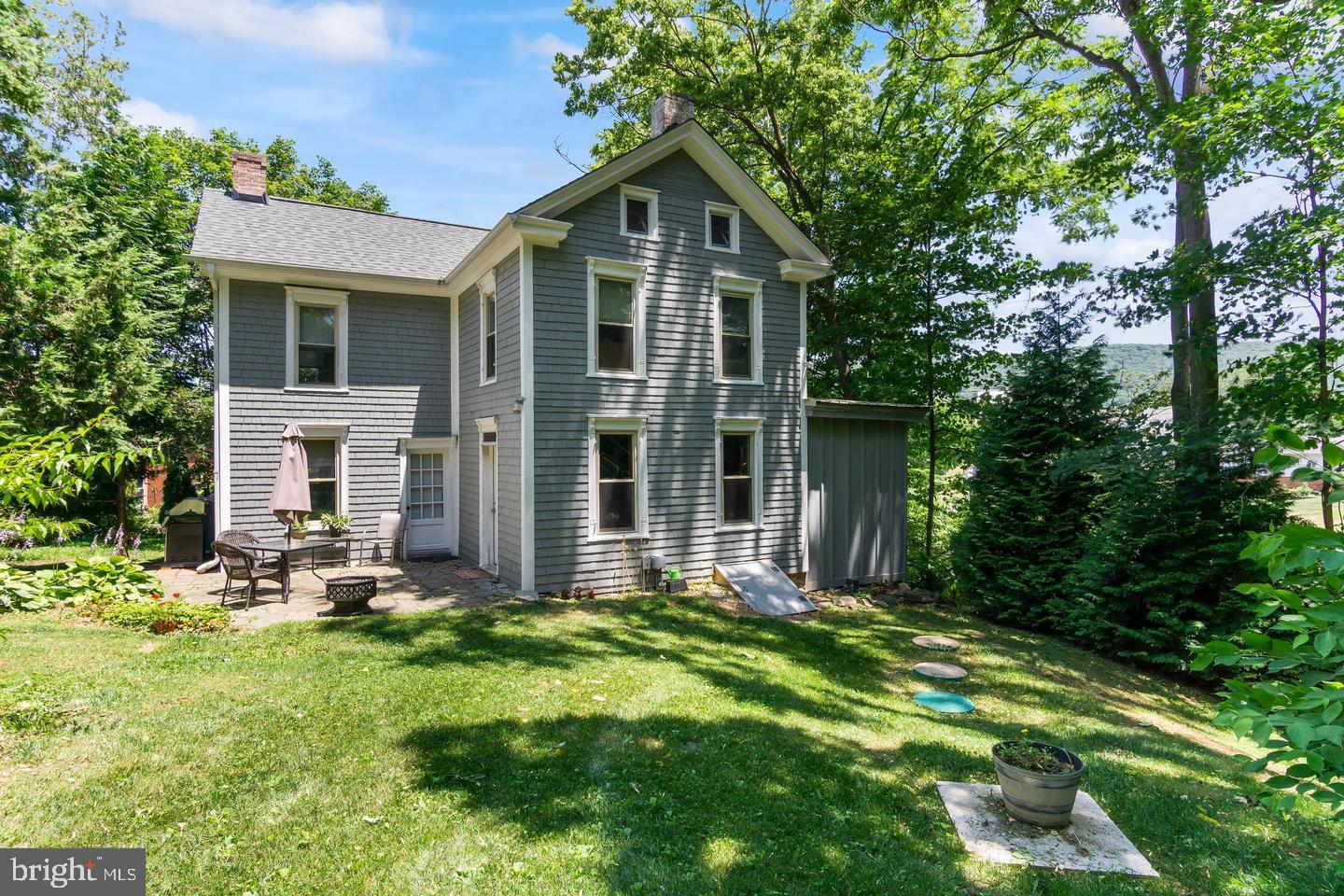 4312 Main Street Rohrersville, MD 21779 - Photo 40 of 58 a front view of house with yard and green space
