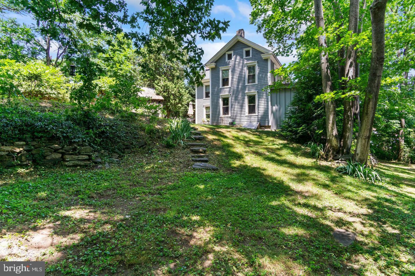 4312 Main Street Rohrersville, MD 21779 - Photo 41 of 58 a front view of a house with a yard