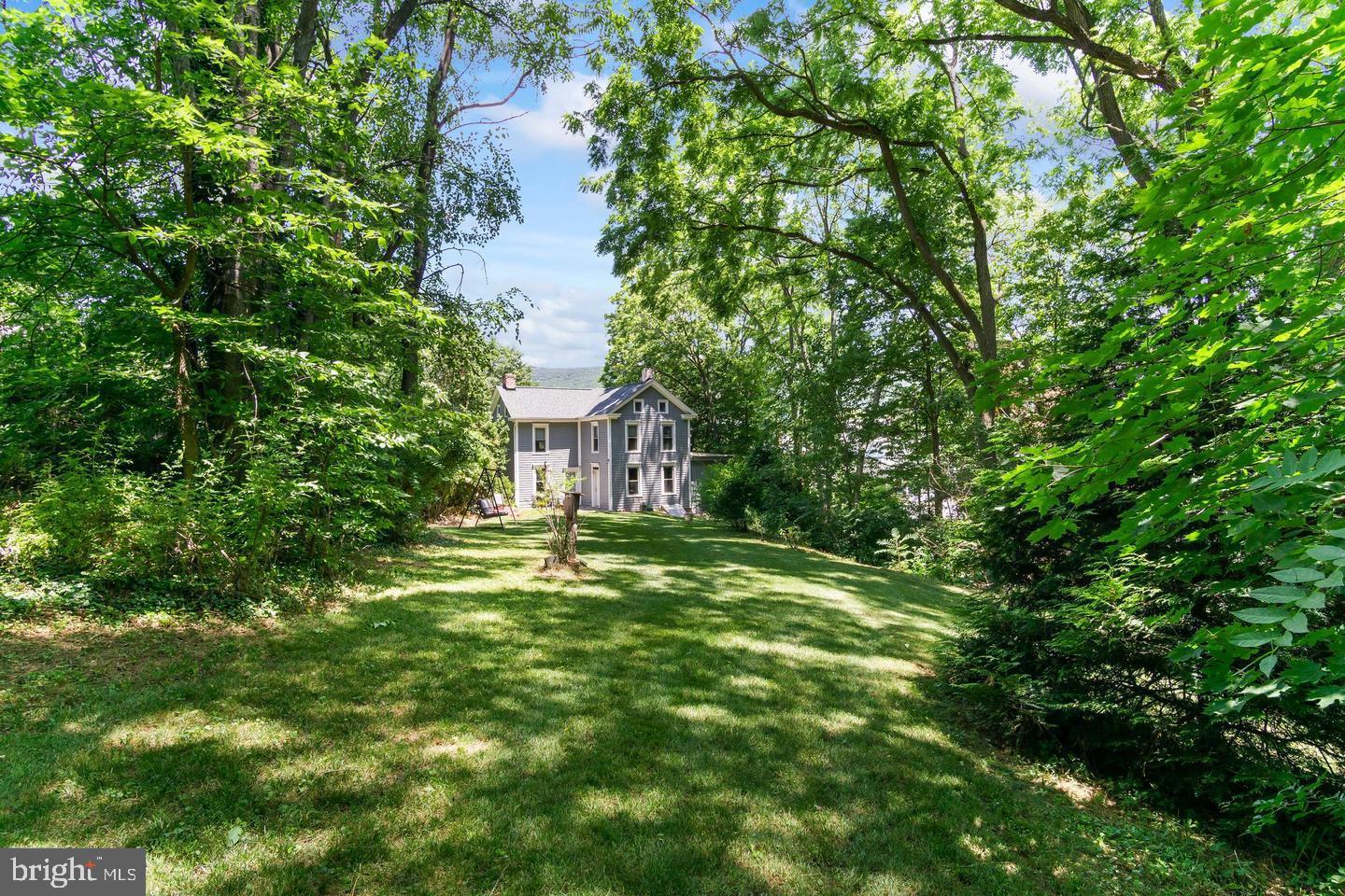 4312 Main Street Rohrersville, MD 21779 - Photo 46 of 58 a view of a big yard with large trees