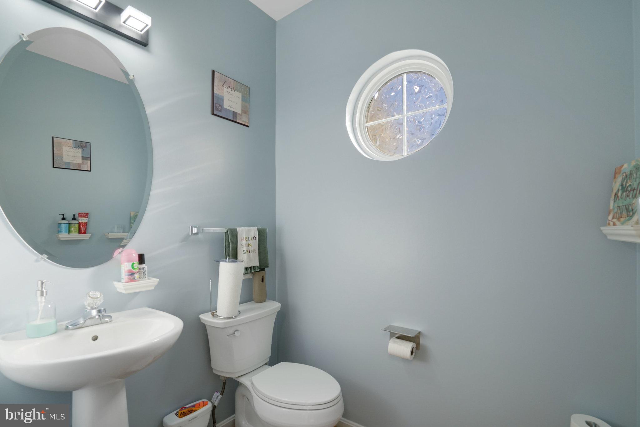 5026 Fallen Timber Way Indian Head, MD 20640 - Photo 21 of 62 a bathroom with a toilet a sink and a mirror
