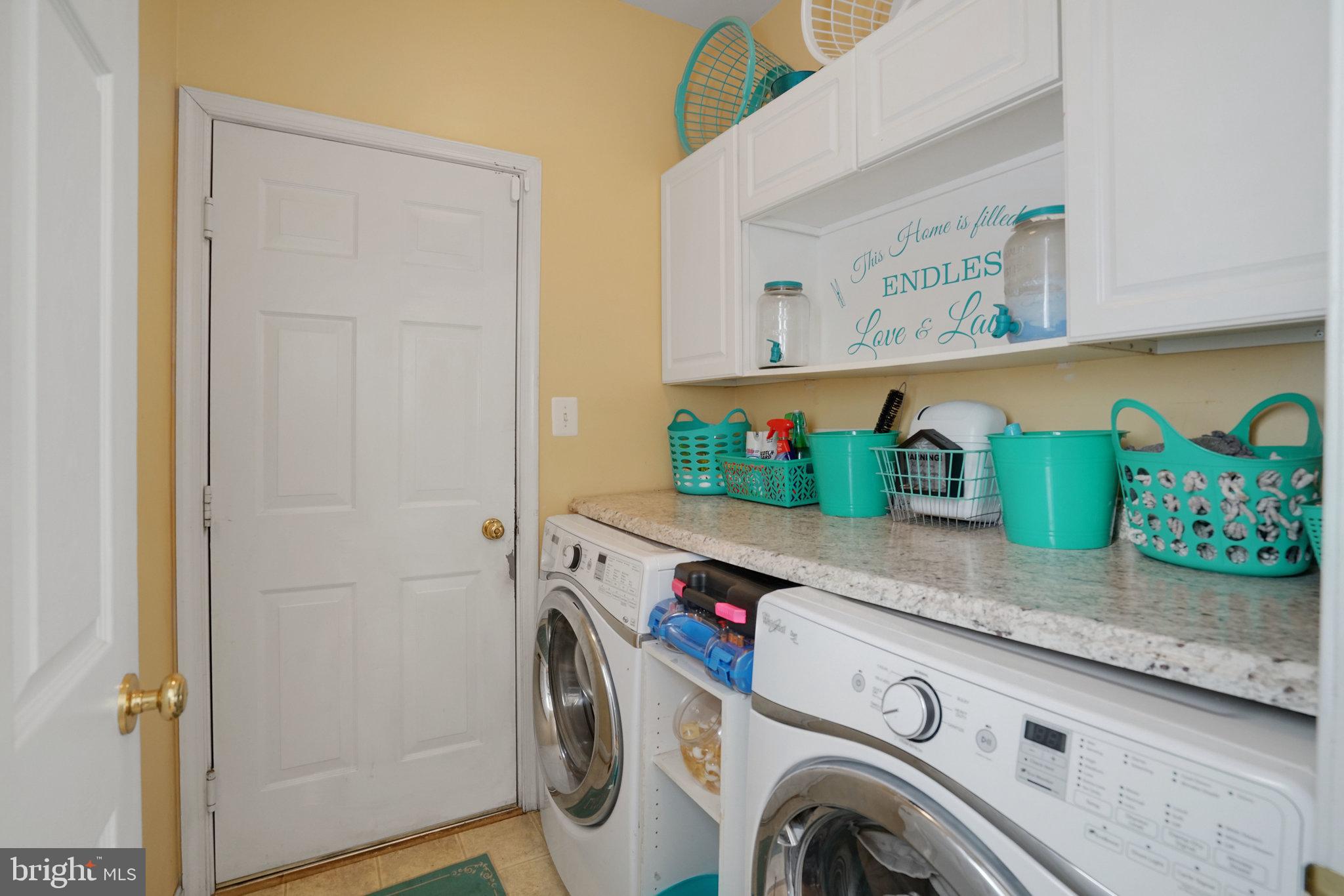 5026 Fallen Timber Way Indian Head, MD 20640 - Photo 22 of 62 a utility room with dryer and washer