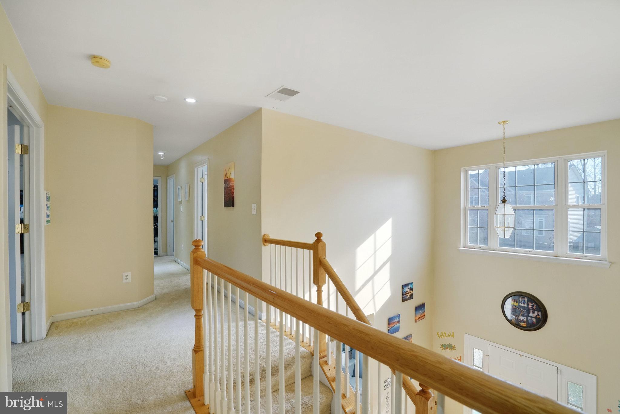 5026 Fallen Timber Way Indian Head, MD 20640 - Photo 23 of 62 a view of a hallway to a livingroom with furniture and windows