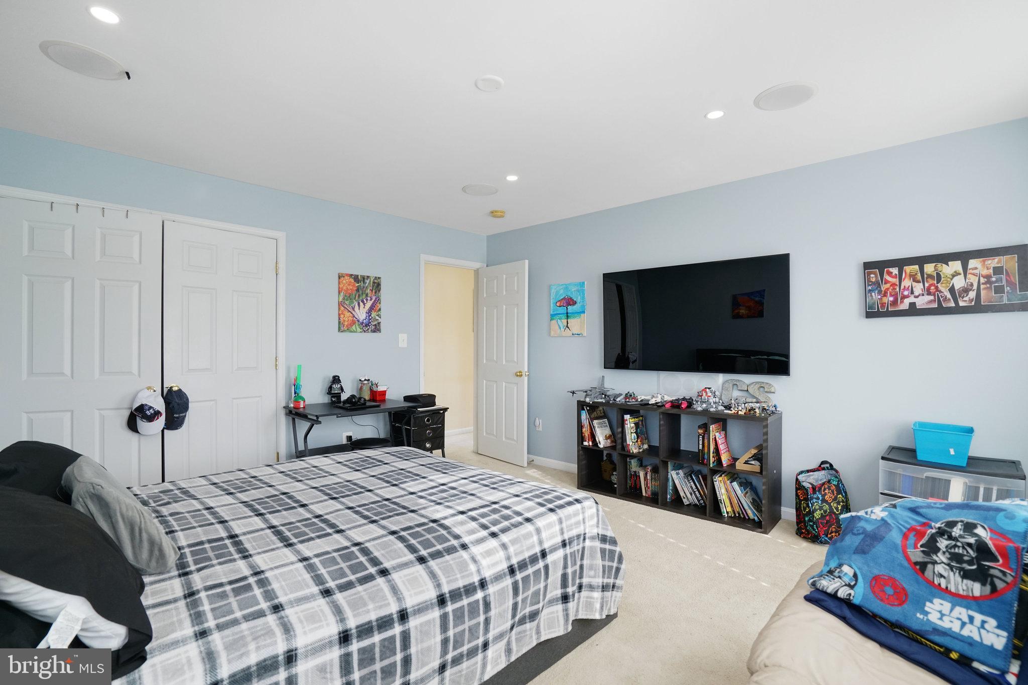 5026 Fallen Timber Way Indian Head, MD 20640 - Photo 37 of 62 a bedroom with a bed and a flat screen tv