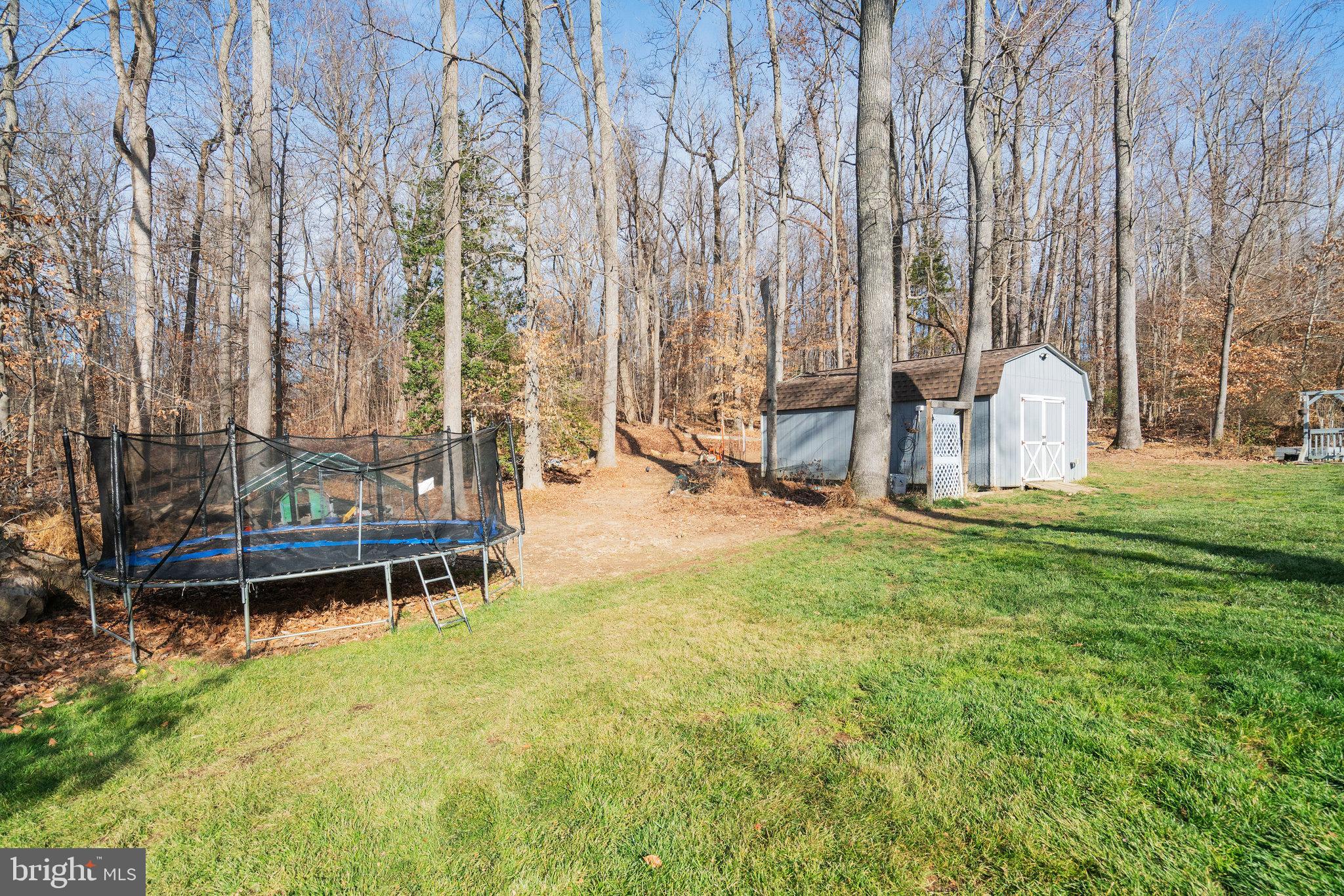 5026 Fallen Timber Way Indian Head, MD 20640 - Photo 56 of 62 a view of a bench in backyard of house