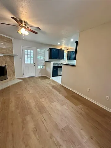 a view of a livingroom with a fireplace