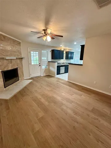 a view of a livingroom with a fireplace