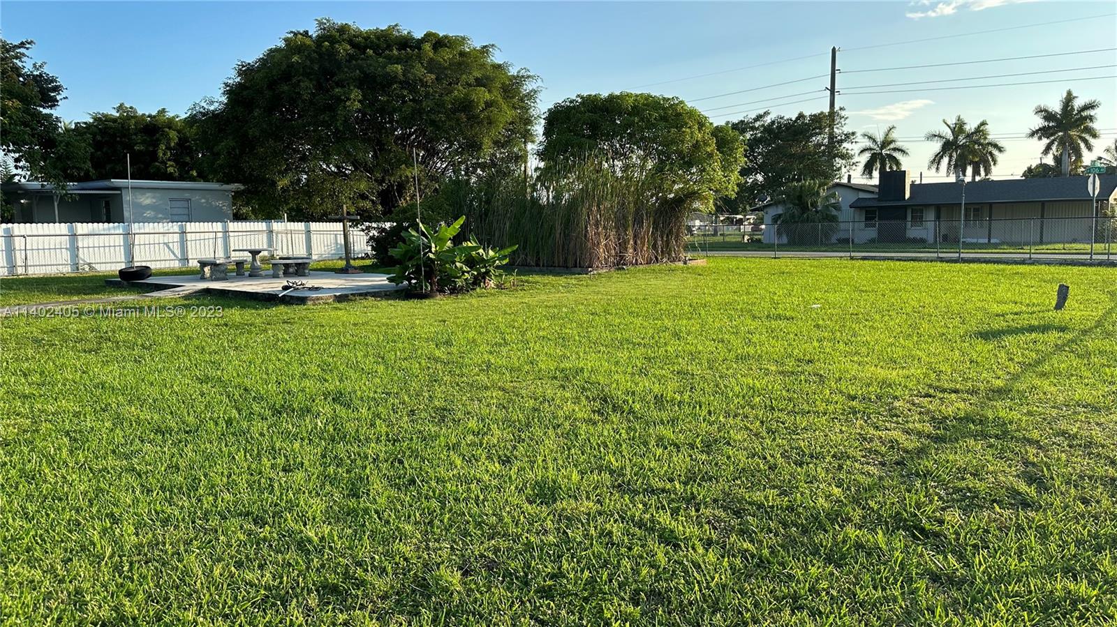 Miami-Dade County Miami, FL 33176 - Photo 2 of 3 a view of a swimming pool with a garden