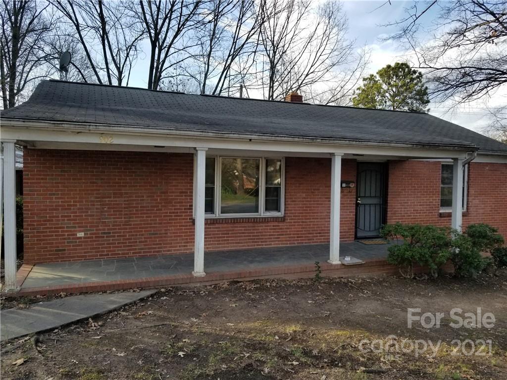 902 Druid Circle Charlotte, NC 28206 - Photo 17 of 24 a front view of a house with garden