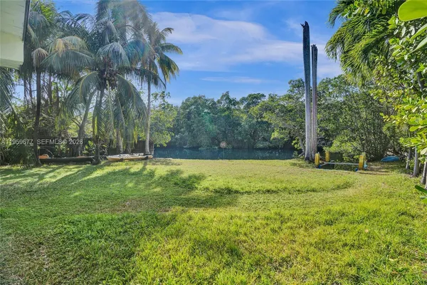 a view of swimming pool with a garden